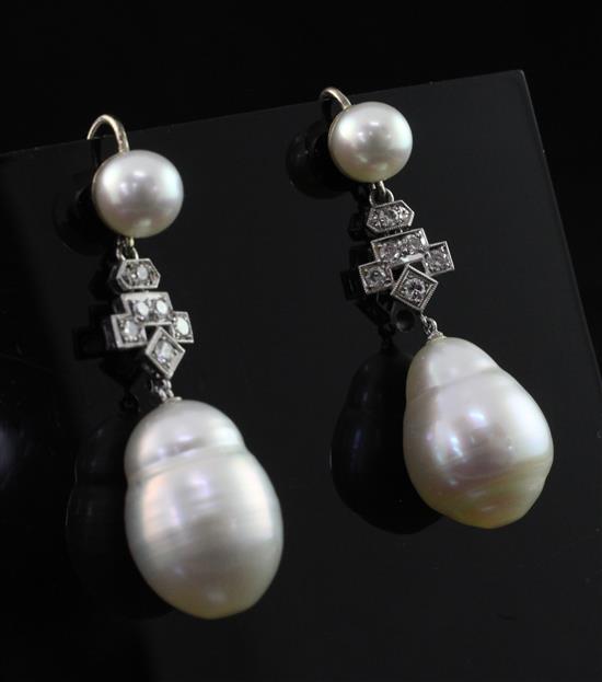 A pair of 18ct white gold, cultured pearl and diamond drop earrings, 1.5in.